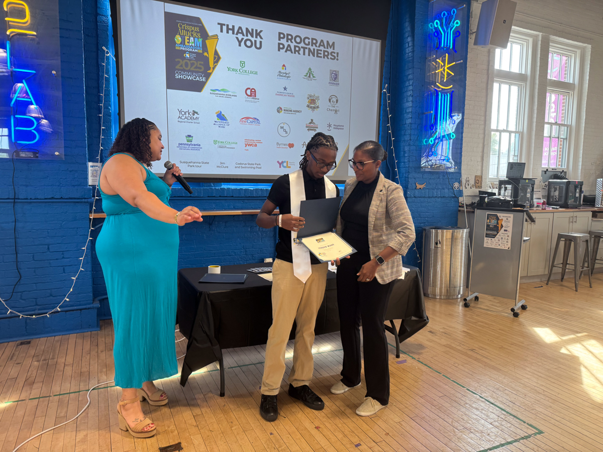 Crispus Attucks STEAM Ambassadors pose with certificates at 2025 Community Showcase at Keystone Kidspace in York, PA