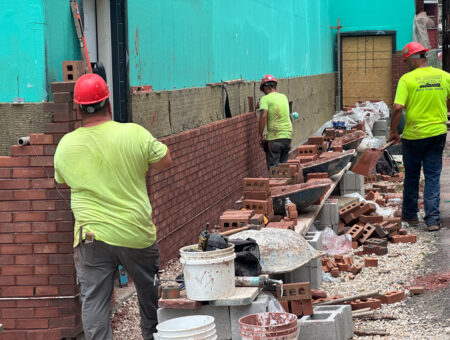 Masonry construction has started here at the HCC Site!